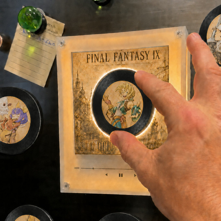Setting a disc on the player - shown at hand scale on a fridge door